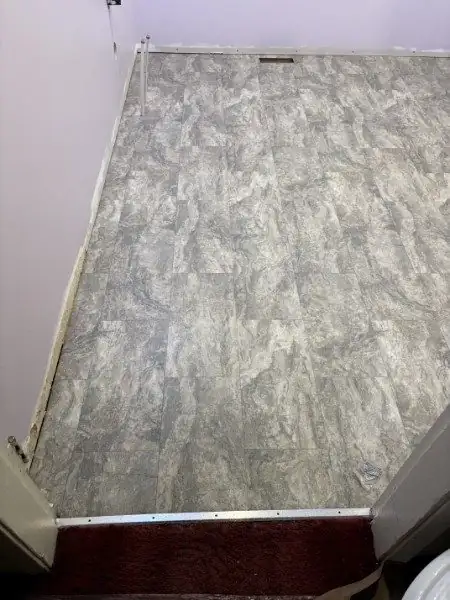Same room, finished in stone-look sheet vinyl