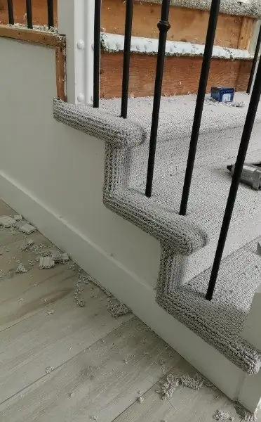 The bottom steps wrapped, spindles and all